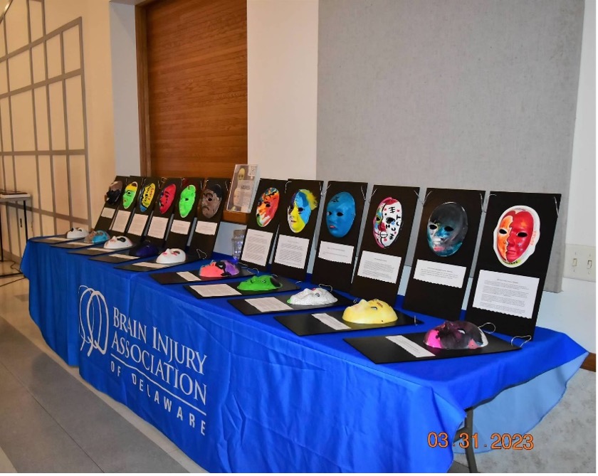 These masks were painted by brain injury survivors from Sussex, Kent, and New Castle Counties at our 2020 Conference as a part of a program allowing them to express how their brain injury felt to them. Each mask tells a different story. We use these masks now to promote awareness of the prevalence of brain injury and to give survivors a voice and the means to educate others on what it is like to live with a brain injury. This also helps to show others that people living with a disability due to their brain injury are like anyone else, deserving of dignity, respect, and compassion.